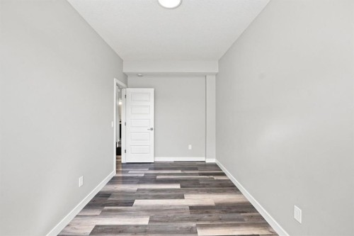 11 Savanna Villas Ne, Calgary, AB - Indoor Photo Showing Other Room