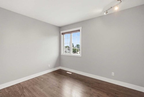 606 Schubert Place Nw, Calgary, AB - Indoor Photo Showing Other Room