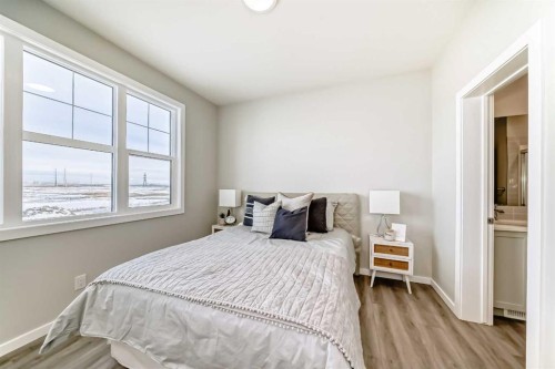 136 Heirloom Street Se, Calgary, AB - Indoor Photo Showing Bedroom