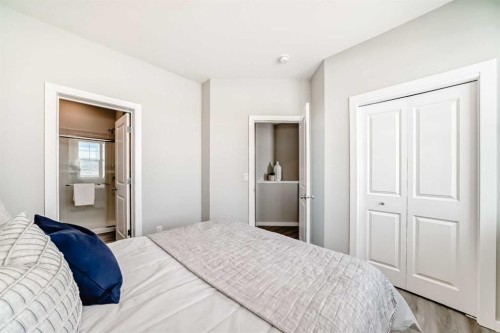 136 Heirloom Street Se, Calgary, AB - Indoor Photo Showing Bedroom