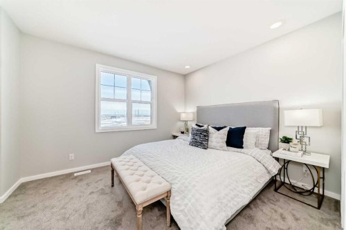 136 Heirloom Street Se, Calgary, AB - Indoor Photo Showing Bedroom