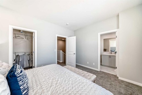 136 Heirloom Street Se, Calgary, AB - Indoor Photo Showing Bedroom