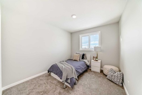 136 Heirloom Street Se, Calgary, AB - Indoor Photo Showing Bedroom