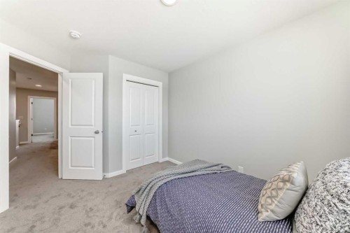 136 Heirloom Street Se, Calgary, AB - Indoor Photo Showing Bedroom