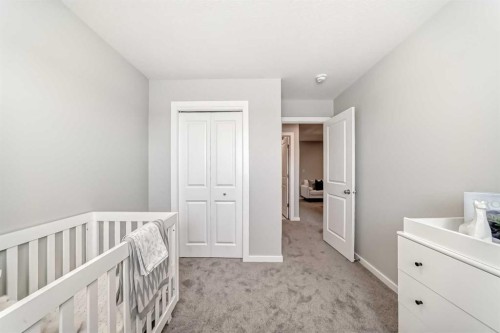 136 Heirloom Street Se, Calgary, AB - Indoor Photo Showing Bedroom