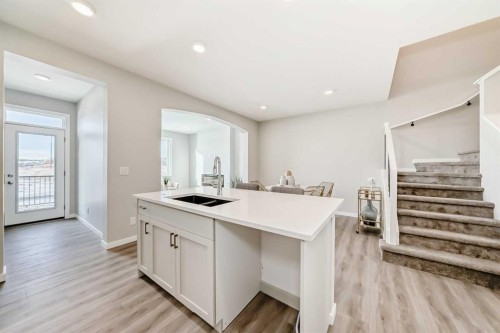 136 Heirloom Street Se, Calgary, AB - Indoor Photo Showing Kitchen With Double Sink