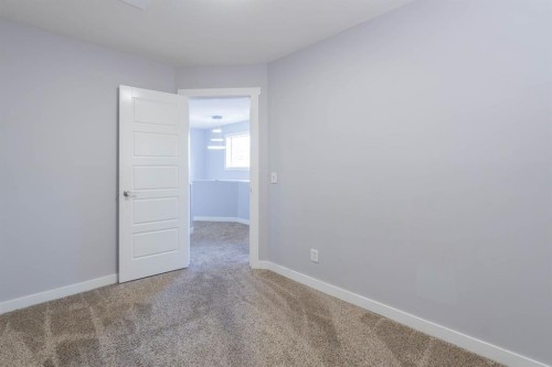 47 Everstone Boulevard Sw, Calgary, AB - Indoor Photo Showing Other Room