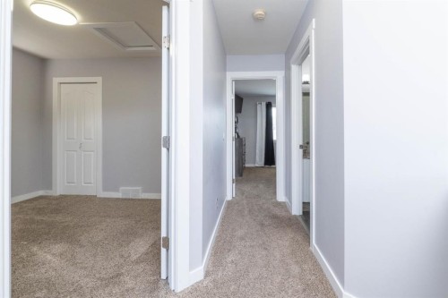 47 Everstone Boulevard Sw, Calgary, AB - Indoor Photo Showing Other Room