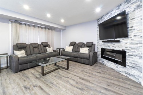 47 Everstone Boulevard Sw, Calgary, AB - Indoor With Fireplace