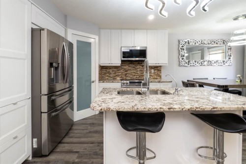 47 Everstone Boulevard Sw, Calgary, AB - Indoor Photo Showing Kitchen With Upgraded Kitchen