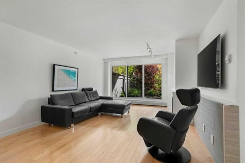 107-1732 9A Street Sw, Calgary, AB - Indoor Photo Showing Living Room