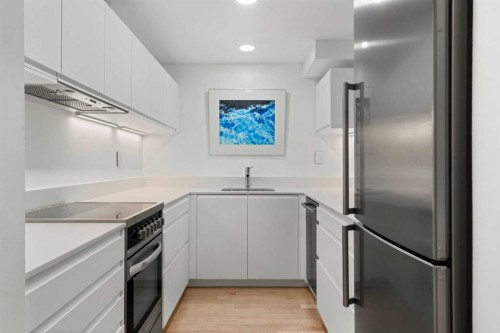 107-1732 9A Street Sw, Calgary, AB - Indoor Photo Showing Kitchen With Stainless Steel Kitchen With Upgraded Kitchen