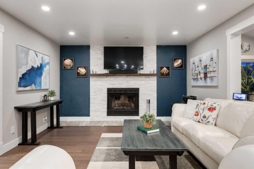 9915 Patton Road Sw, Calgary, AB - Indoor Photo Showing Living Room With Fireplace