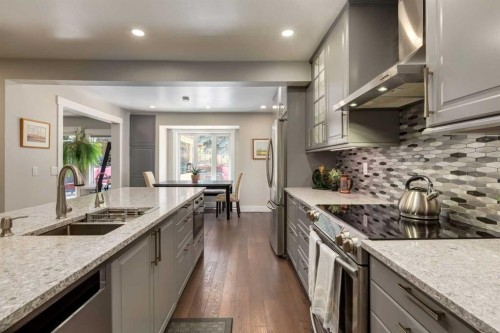 9915 Patton Road Sw, Calgary, AB - Indoor Photo Showing Kitchen With Double Sink With Upgraded Kitchen