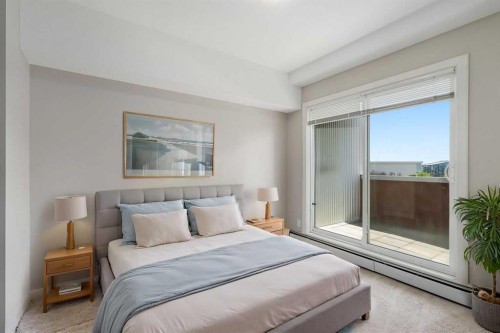 2307-604 East Lake Boulevard Ne, Airdrie, AB - Indoor Photo Showing Bedroom