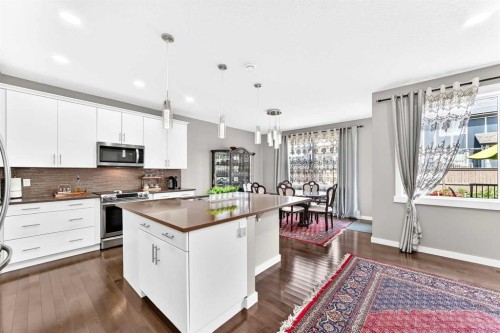 56 Evansborough Green Nw, Calgary, AB - Indoor Photo Showing Kitchen With Upgraded Kitchen