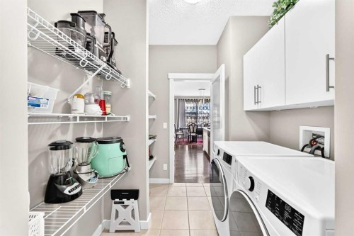 56 Evansborough Green Nw, Calgary, AB - Indoor Photo Showing Laundry Room