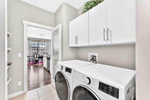 56 Evansborough Green Nw, Calgary, AB - Indoor Photo Showing Laundry Room