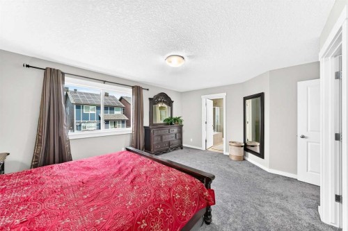 56 Evansborough Green Nw, Calgary, AB - Indoor Photo Showing Bedroom