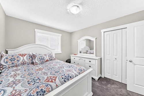 56 Evansborough Green Nw, Calgary, AB - Indoor Photo Showing Bedroom