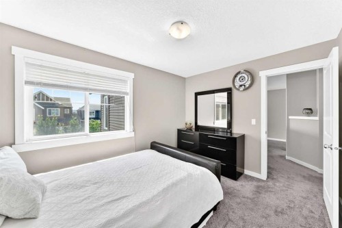 56 Evansborough Green Nw, Calgary, AB - Indoor Photo Showing Bedroom