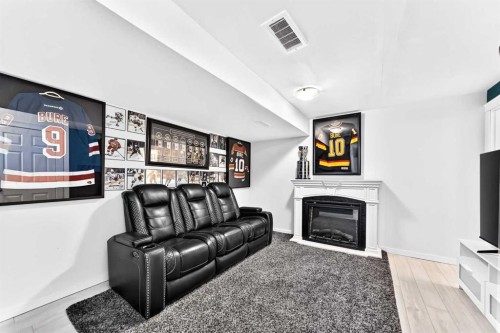 144 Copperstone Gardens, Calgary, AB - Indoor Photo Showing Living Room With Fireplace