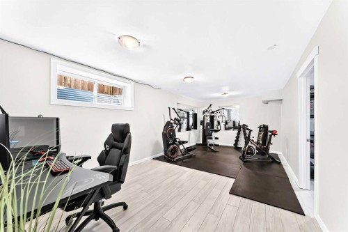 144 Copperstone Gardens, Calgary, AB - Indoor Photo Showing Gym Room
