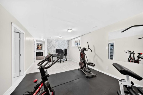 144 Copperstone Gardens, Calgary, AB - Indoor Photo Showing Gym Room