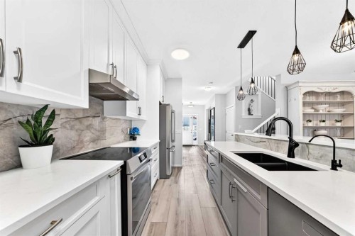 144 Copperstone Gardens, Calgary, AB - Indoor Photo Showing Kitchen With Double Sink With Upgraded Kitchen