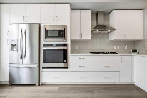 902 Sage Hill Grove Nw, Calgary, AB - Indoor Photo Showing Kitchen With Upgraded Kitchen
