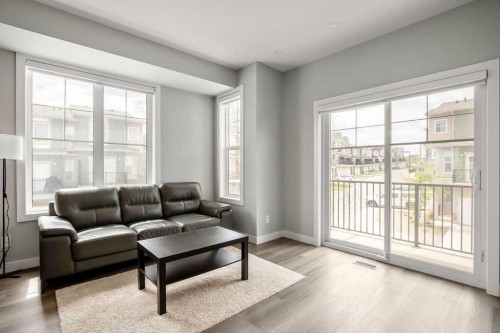 902 Sage Hill Grove Nw, Calgary, AB - Indoor Photo Showing Living Room