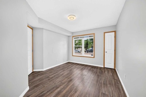 103-160 Panatella Landing Nw, Calgary, AB - Indoor Photo Showing Other Room
