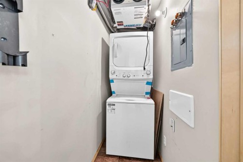 103-160 Panatella Landing Nw, Calgary, AB - Indoor Photo Showing Laundry Room