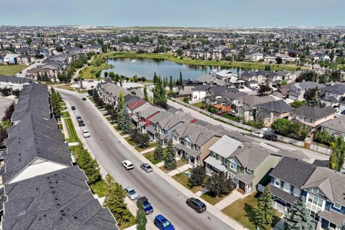 103-160 Panatella Landing Nw, Calgary, AB - Outdoor With Body Of Water With View