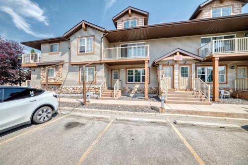 103-160 Panatella Landing Nw, Calgary, AB - Outdoor With Facade