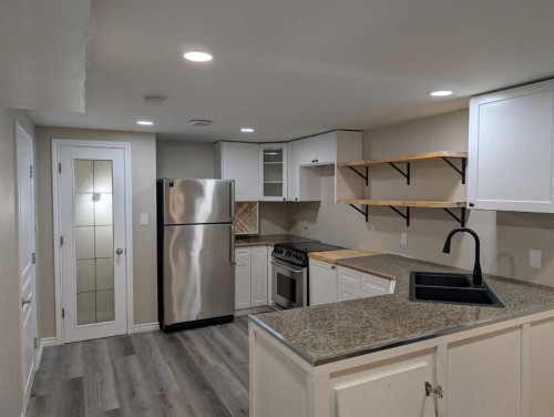 2614 44 Street Se, Calgary, AB - Indoor Photo Showing Kitchen With Double Sink