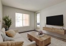 113-2715 12 Avenue Se, Calgary, AB  - Indoor Photo Showing Living Room 