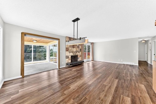5820 Dalridge Hill Nw, Calgary, AB - Indoor Photo Showing Living Room With Fireplace