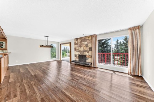 5820 Dalridge Hill Nw, Calgary, AB - Indoor Photo Showing Living Room With Fireplace