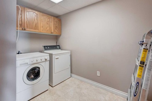 304-728 Country Hills Road Nw, Calgary, AB - Indoor Photo Showing Laundry Room
