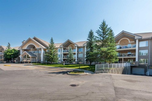 304-728 Country Hills Road Nw, Calgary, AB - Outdoor With Balcony With Facade