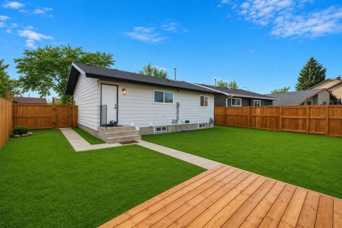 1174 Abbeydale Drive Ne, Calgary, AB - Outdoor With Deck Patio Veranda With Backyard