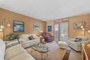 52 Macewan Park Heights Nw, Calgary, AB  - Indoor Photo Showing Living Room 