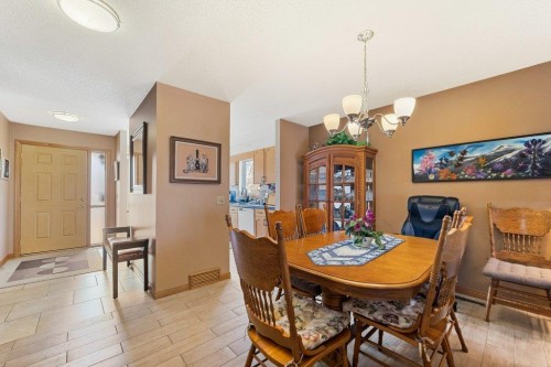 52 Macewan Park Heights Nw, Calgary, AB - Indoor Photo Showing Dining Room