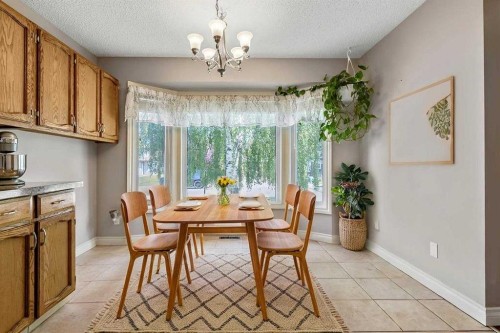 163 Woodburn Crescent, Okotoks, AB - Indoor Photo Showing Dining Room