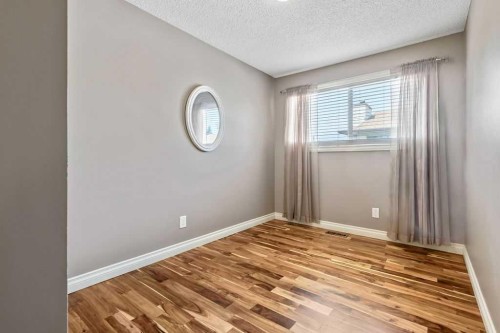 163 Woodburn Crescent, Okotoks, AB - Indoor Photo Showing Other Room