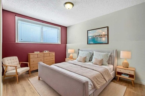 163 Woodburn Crescent, Okotoks, AB - Indoor Photo Showing Bedroom