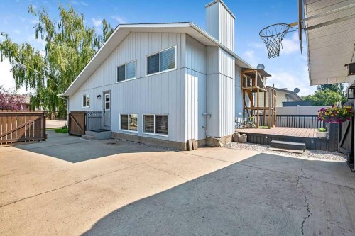163 Woodburn Crescent, Okotoks, AB - Outdoor With Deck Patio Veranda With Exterior