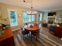 672 Killarney Glen Court Sw, Calgary, AB  - Indoor Photo Showing Dining Room With Fireplace 