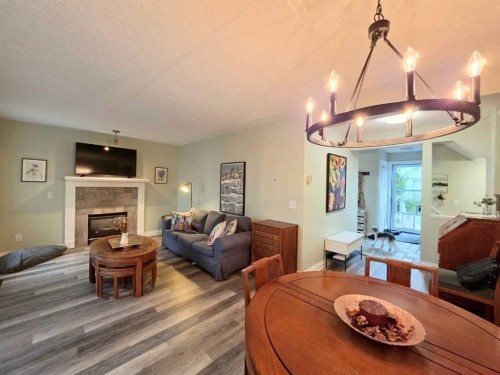 672 Killarney Glen Court Sw, Calgary, AB - Indoor Photo Showing Living Room With Fireplace